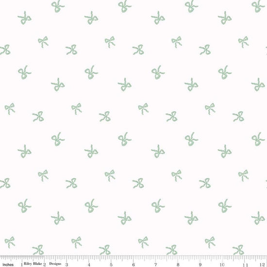 Image of Designer Flannel Sweet Cotton Tales Bows White quilting cotton fabric by Little Forest Atelier for RIley Blake Designs. Features bows on a white background. Cute Little Fabric Shop.