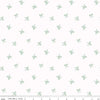 Image of Designer Flannel Sweet Cotton Tales Bows White quilting cotton fabric by Little Forest Atelier for RIley Blake Designs. Features bows on a white background. Cute Little Fabric Shop.