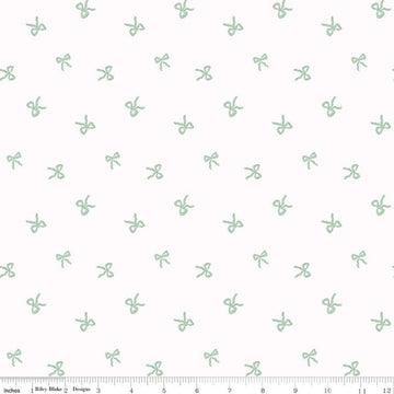 Image of Designer Flannel Sweet Cotton Tales Bows White quilting cotton fabric by Little Forest Atelier for RIley Blake Designs. Features bows on a white background. Cute Little Fabric Shop.