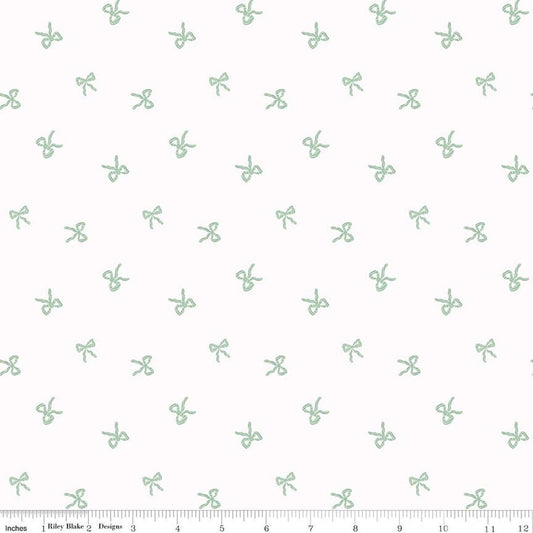 Image of Designer Flannel Sweet Cotton Tales Bows White quilting cotton fabric by Little Forest Atelier for RIley Blake Designs. Features bows on a white background. Cute Little Fabric Shop.