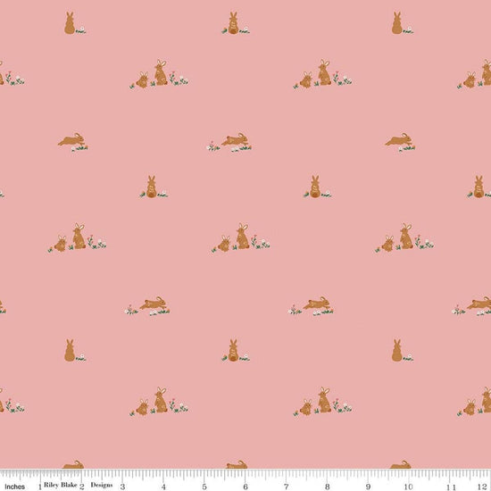 Image of Designer Flannel Sweet Cotton Tales Flopsy Fields Pink quilting cotton fabric by Little Forest Atelier for RIley Blake Designs. Features bunnies on a pink background. Cute Little Fabric Shop.