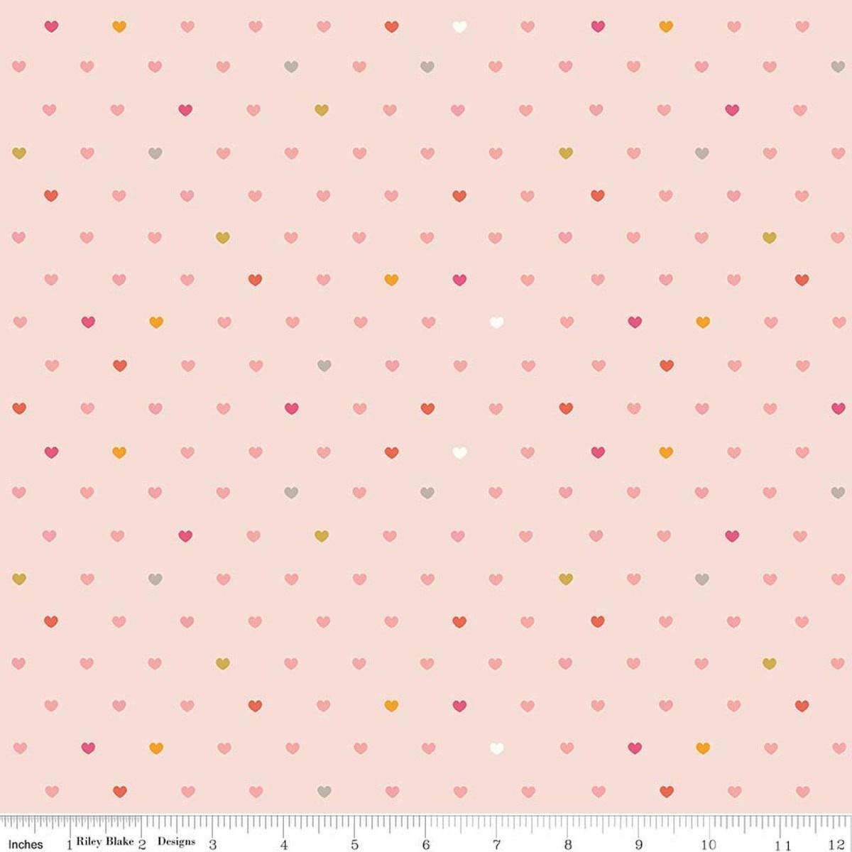 Image of Designer Flannel Meadow Serendipity 2 Hearts Blush flannel cotton fabric by Minki Kim for Riley Blake Designs. Features hearts on a pink background. Cute Little Fabric Shop.