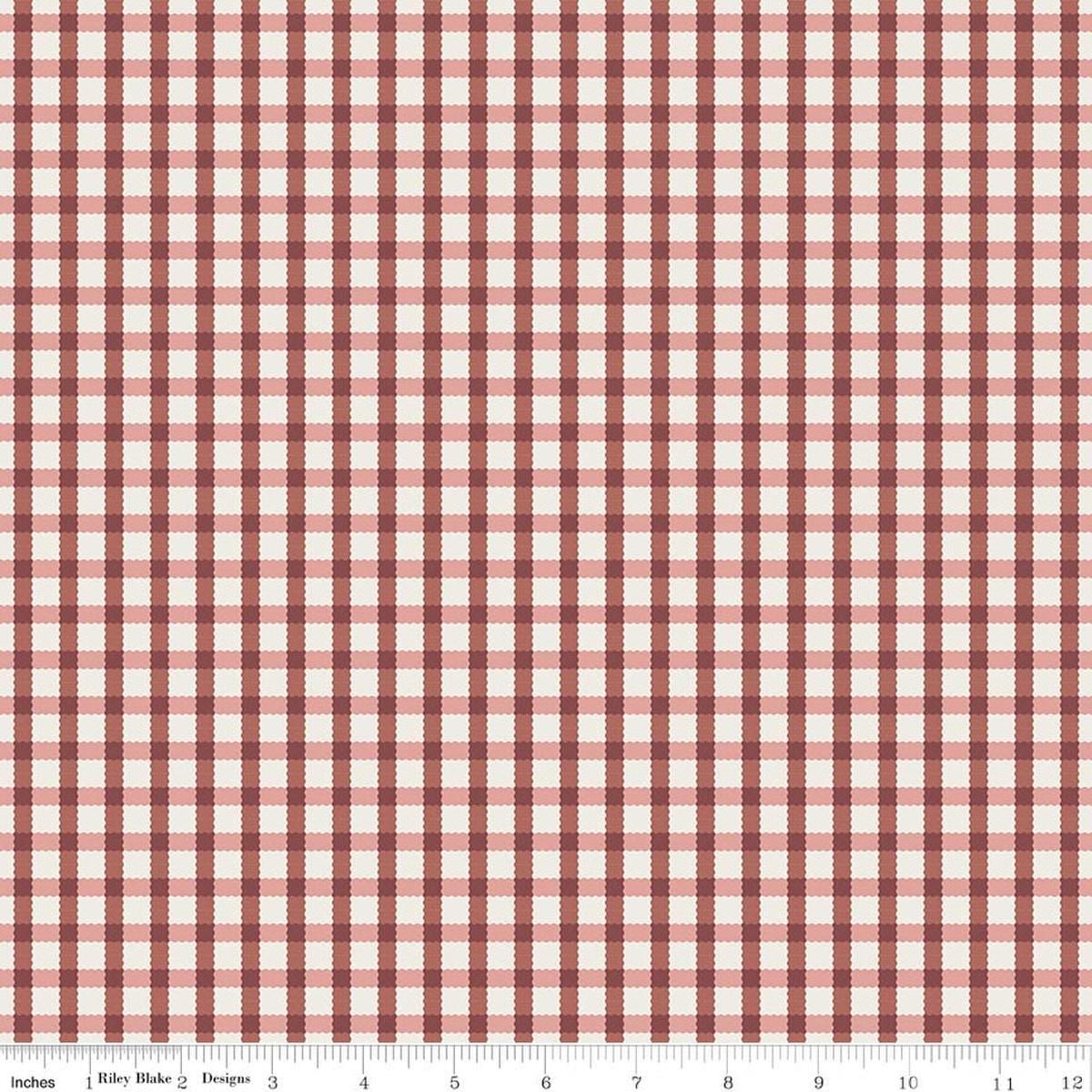 Image of Rosewood Hearth Dusty Rose quilting cotton fabric by Jessica Chertkow for Riley Blake Designs. Features checks on a pink background. Cute Little Fabric Shop.