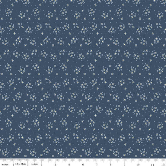 Image of Rosewood Posy Oxford quilting cotton fabric by Jessica Chertkow for Riley Blake Designs. Features flowers on a blue background. Cute Little Fabric Shop.