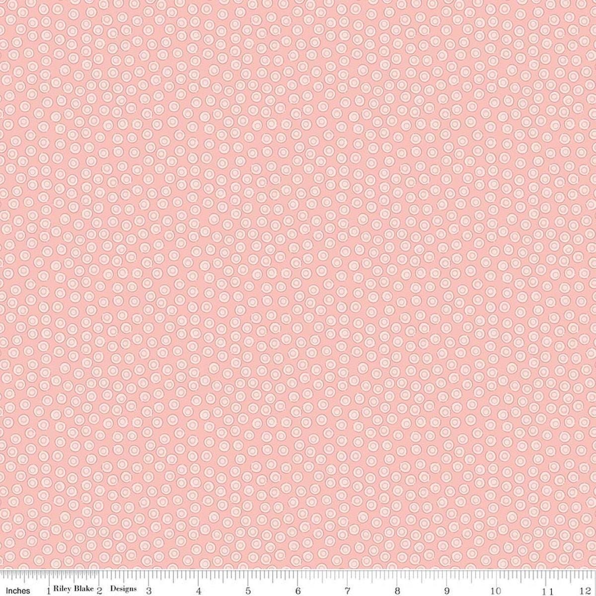 Image of Rosewood Cameo Pink quilting cotton fabric by Jessica Chertkow for Riley Blake Designs. Features dots on a pink background. Cute Little Fabric Shop.