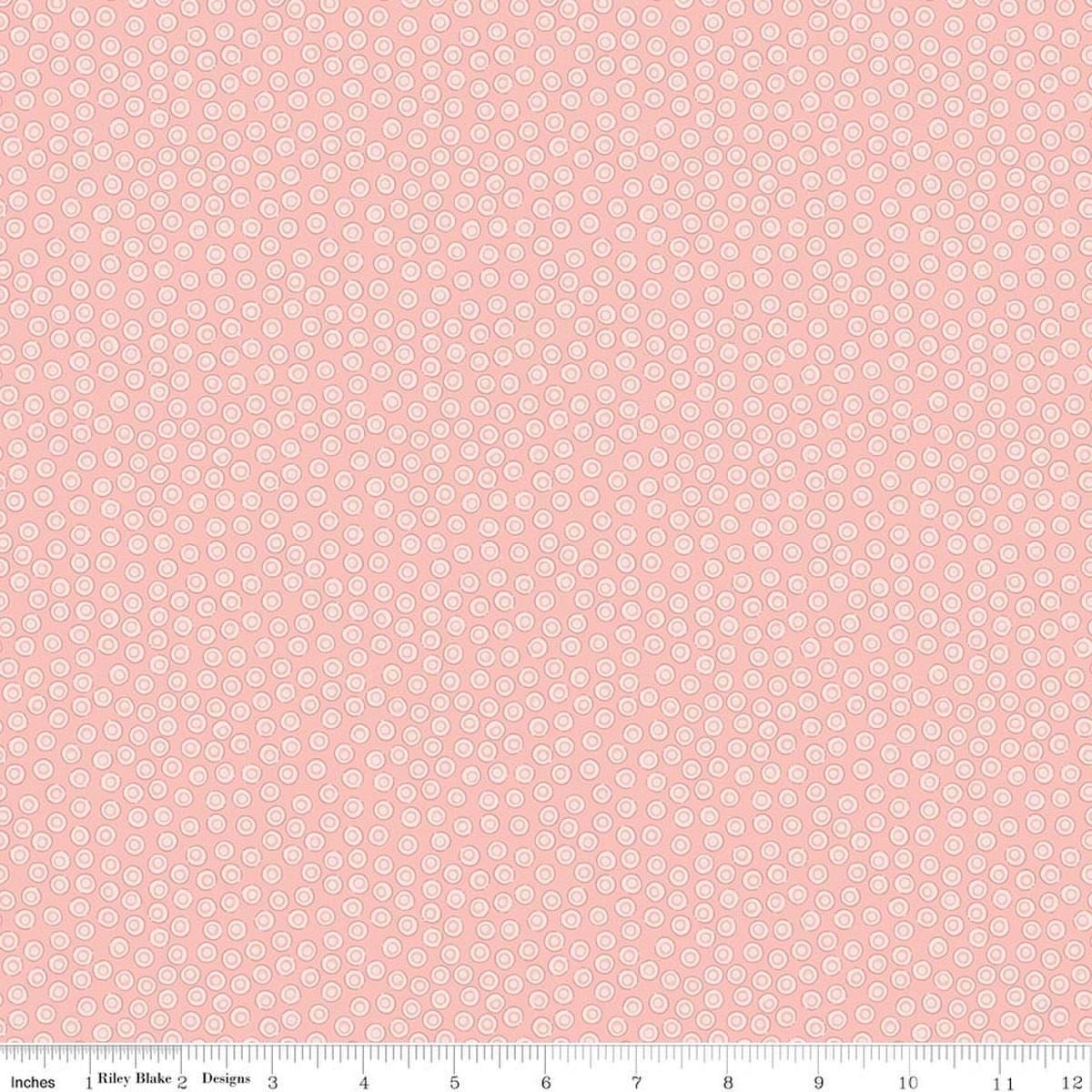 Image of Rosewood Cameo Pink quilting cotton fabric by Jessica Chertkow for Riley Blake Designs. Features dots on a pink background. Cute Little Fabric Shop.
