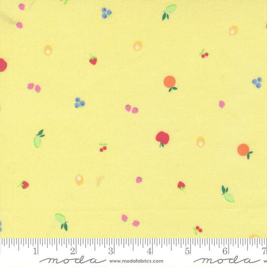 Image of Fruit Salad Snack Lemon quilting cotton fabric by Corey Yoder for Moda Fabrics. Features fruit on a yellow background. Cute Little Fabric Shop.