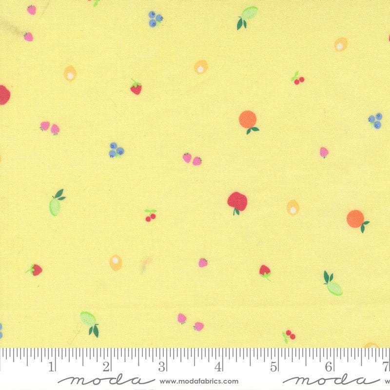 Image of Fruit Salad Snack Lemon quilting cotton fabric by Corey Yoder for Moda Fabrics. Features fruit on a yellow background. Cute Little Fabric Shop.