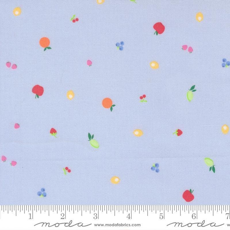 Image of Fruit Salad Snack Light Blue quilting cotton fabric by Corey Yoder for Moda Fabrics. Features fruit on a blue background. Cute Little Fabric Shop.