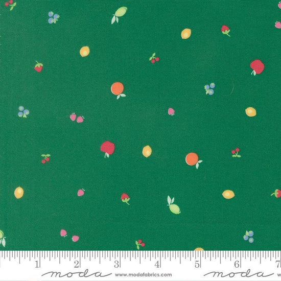 Image of Fruit Salad Snack Emerald quilting cotton fabric by Corey Yoder for Moda Fabrics. Features fruit on a green background. Cute Little Fabric Shop.