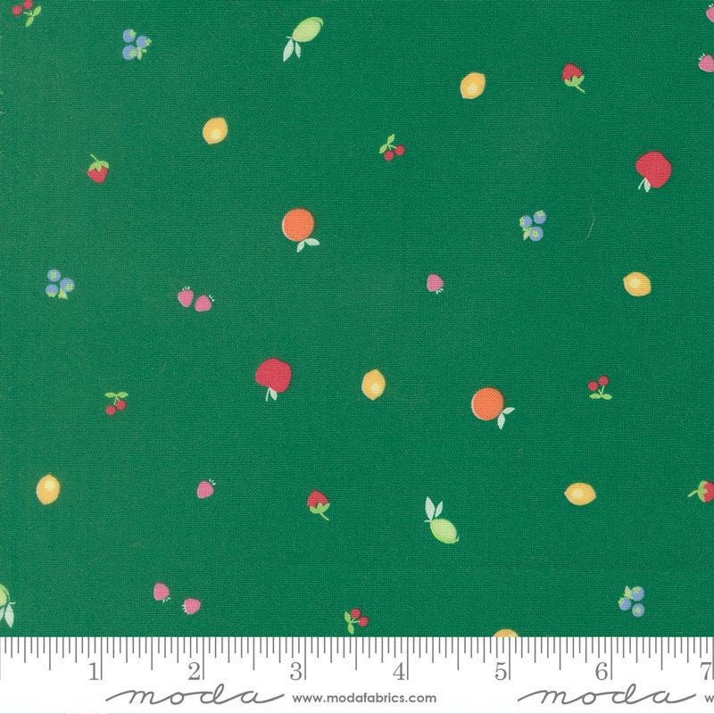 Image of Fruit Salad Snack Emerald quilting cotton fabric by Corey Yoder for Moda Fabrics. Features fruit on a green background. Cute Little Fabric Shop.
