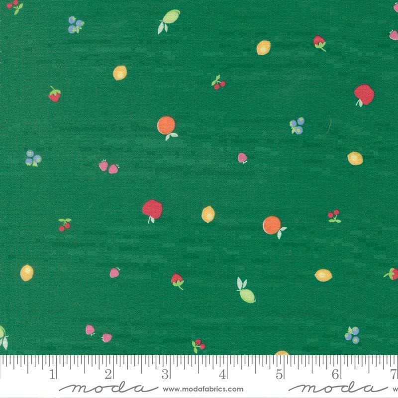 Image of Fruit Salad Snack Emerald quilting cotton fabric by Corey Yoder for Moda Fabrics. Features fruit on a green background. Cute Little Fabric Shop.