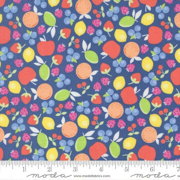 Image of Fruit Salad Novelty Cobalt quilting cotton fabric by Corey Yoder for Moda Fabrics. Features fruit on a blue background. Cute Little Fabric Shop.