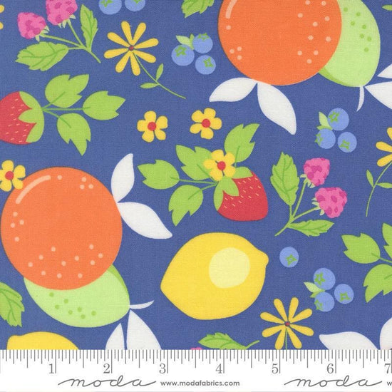 Image of Fruit Salad Fruits Cobalt quilting cotton fabric by Corey Yoder for Moda Fabrics. Features fruit on a blue background. Cute Little Fabric Shop.