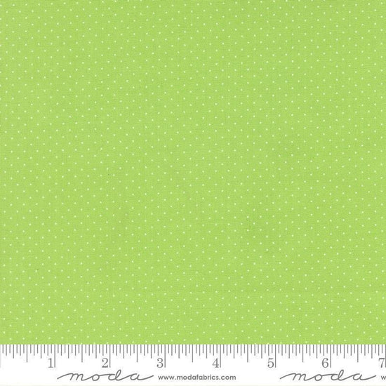 Image of Fruit Salad Dots Lime quilting cotton fabric by Corey Yoder for Moda Fabrics. Features dots on a green background. Cute Little Fabric Shop.
