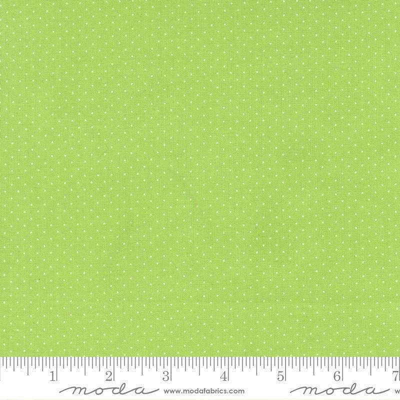 Image of Fruit Salad Dots Lime quilting cotton fabric by Corey Yoder for Moda Fabrics. Features dots on a green background. Cute Little Fabric Shop.