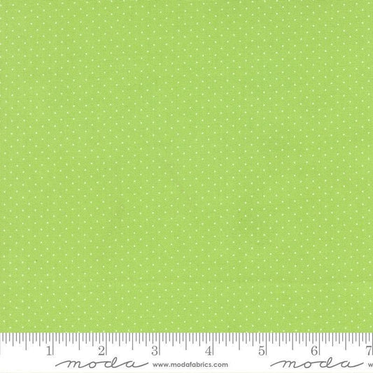 Image of Fruit Salad Dots Lime quilting cotton fabric by Corey Yoder for Moda Fabrics. Features dots on a green background. Cute Little Fabric Shop.