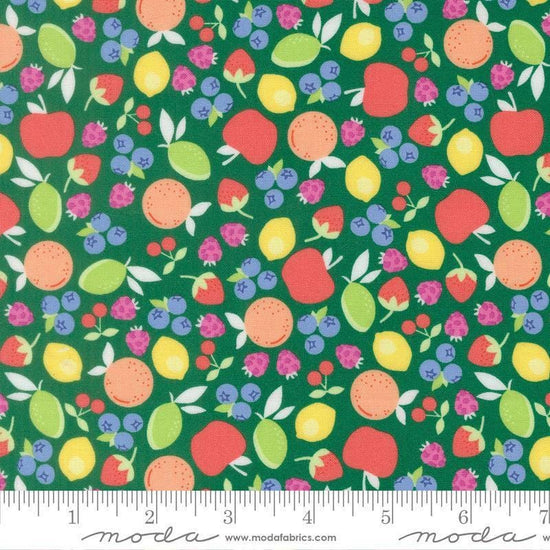 Image of Fruit Salad Novelty Emerald quilting cotton fabric by Corey Yoder for Moda Fabrics. Features fruit on a green background. Cute Little Fabric Shop.