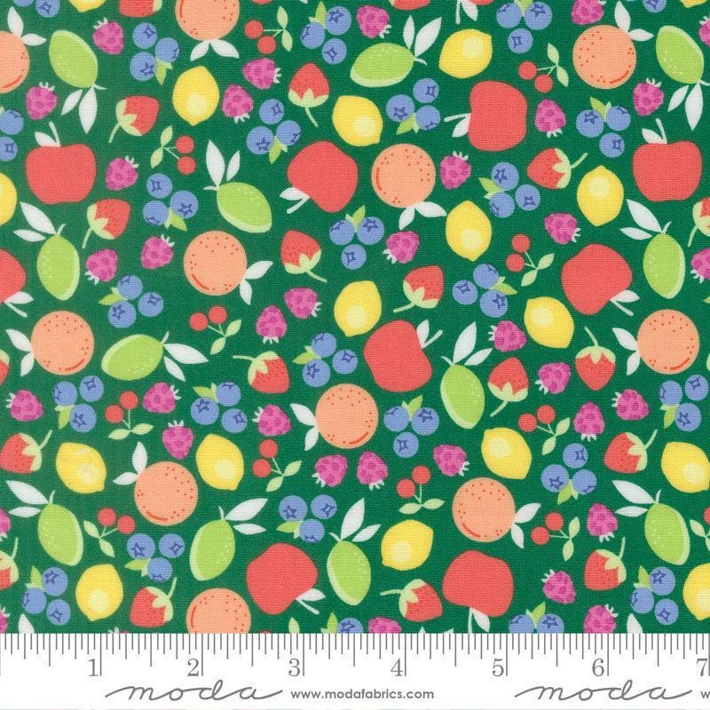Image of Fruit Salad Novelty Emerald quilting cotton fabric by Corey Yoder for Moda Fabrics. Features fruit on a green background. Cute Little Fabric Shop.