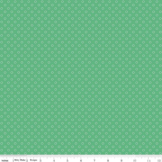 Image of Whimsical Woodland Circle Dots Green quilting cotton fabric by Tasha Noel for Riley Blake Designs. Features dots on a green background. Cute Little Fabric Shop.