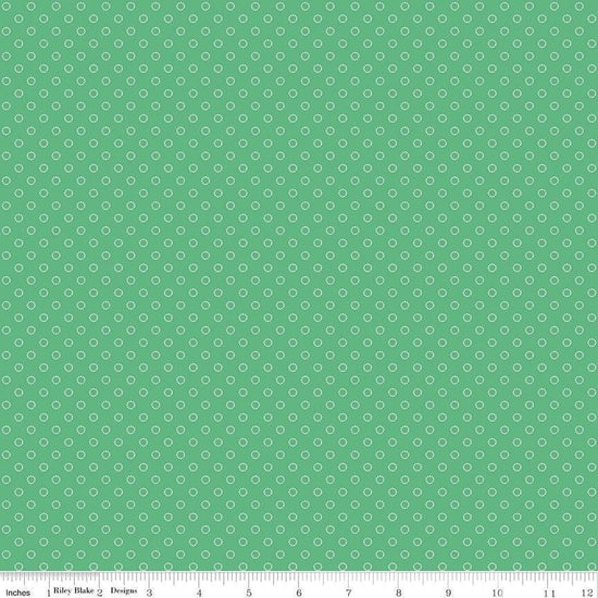Image of Whimsical Woodland Circle Dots Green quilting cotton fabric by Tasha Noel for Riley Blake Designs. Features dots on a green background. Cute Little Fabric Shop.