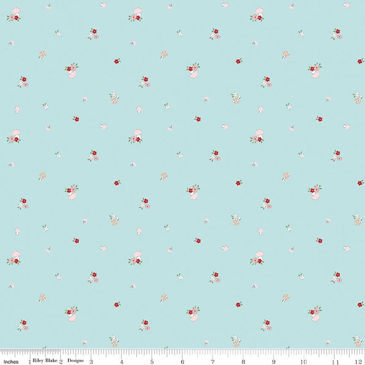 Image of Whimsical Woodland Mushrooms Aqua quilting cotton fabric by Tasha Noel for Riley Blake Designs. Features flowers on a blue background. Cute Little Fabric Shop.