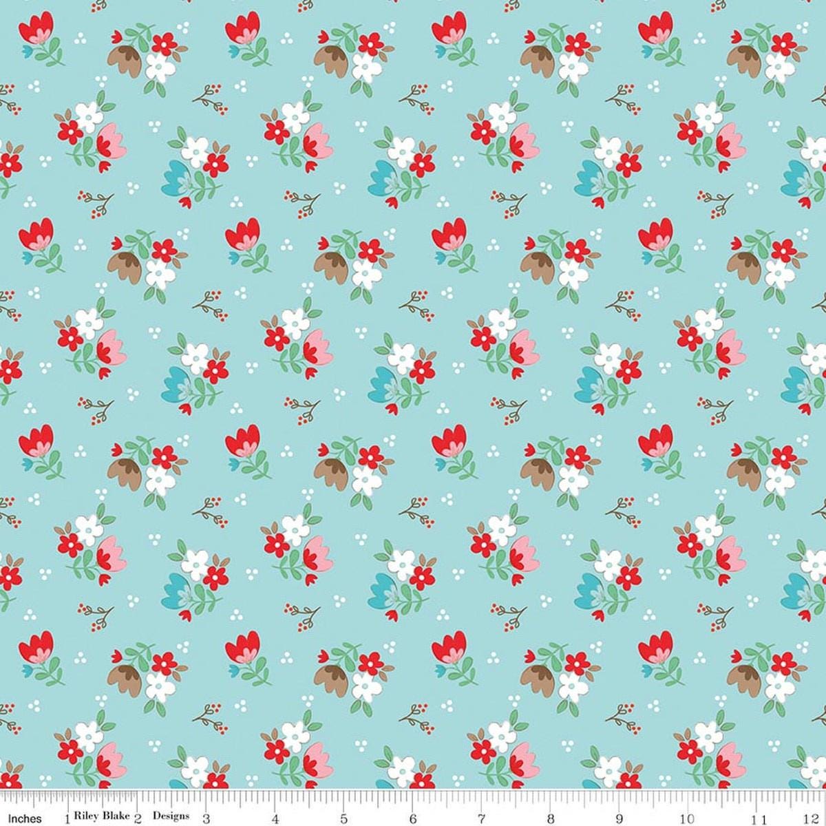 Image of Whimsical Woodland Floral Aqua quilting cotton fabric by Tasha Noel for Riley Blake Designs. Features flowers on a blue background. Cute Little Fabric Shop.