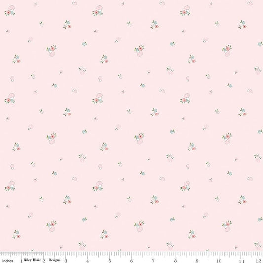 Image of Whimsical Woodland Mushrooms Pink quilting cotton fabric by Tasha Noel for Riley Blake Designs. Features flowers on a pink background. Cute Little Fabric Shop.