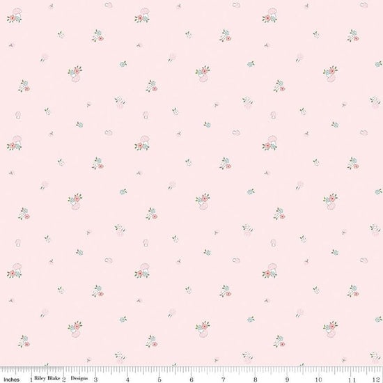 Image of Whimsical Woodland Mushrooms Pink quilting cotton fabric by Tasha Noel for Riley Blake Designs. Features flowers on a pink background. Cute Little Fabric Shop.
