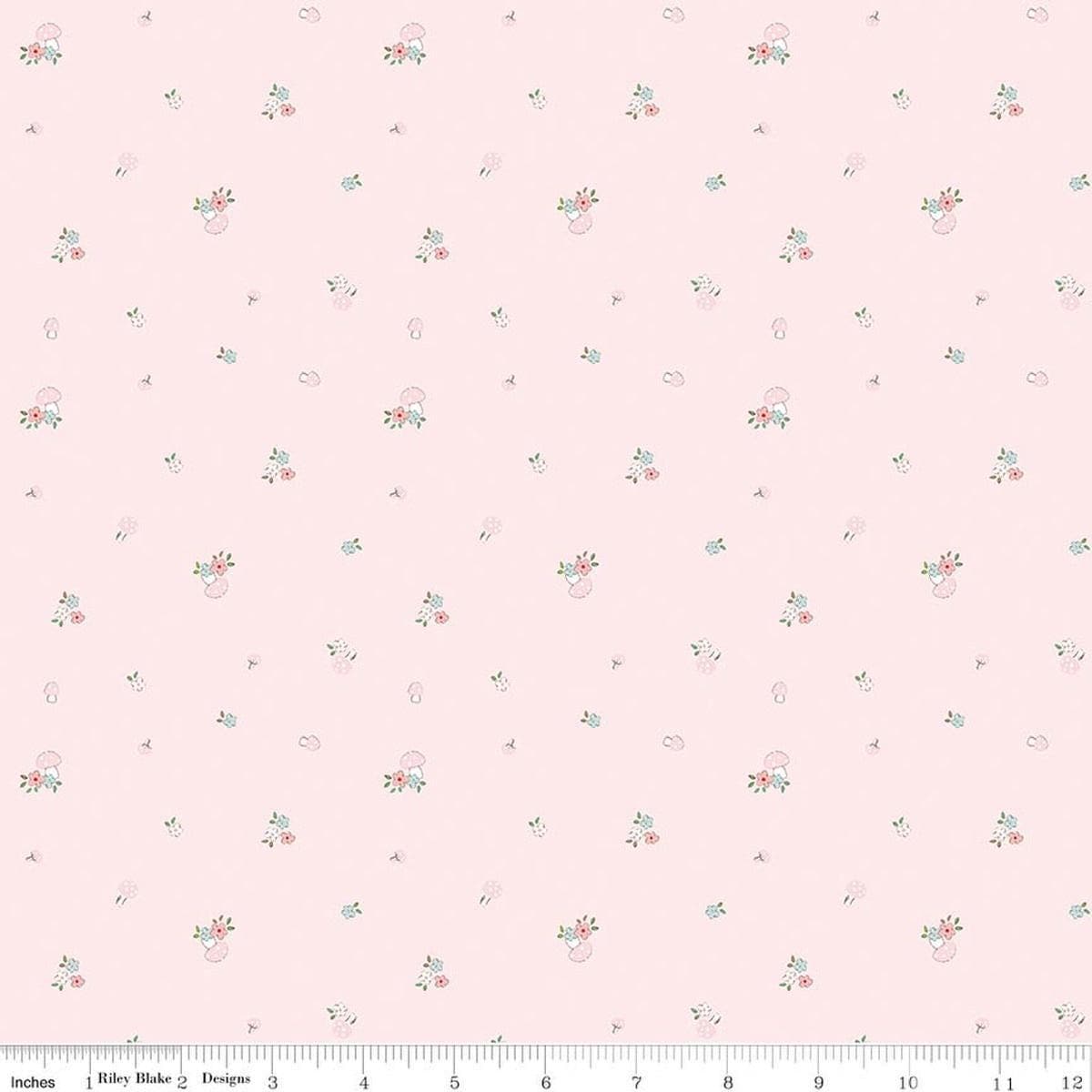 Image of Whimsical Woodland Mushrooms Pink quilting cotton fabric by Tasha Noel for Riley Blake Designs. Features flowers on a pink background. Cute Little Fabric Shop.