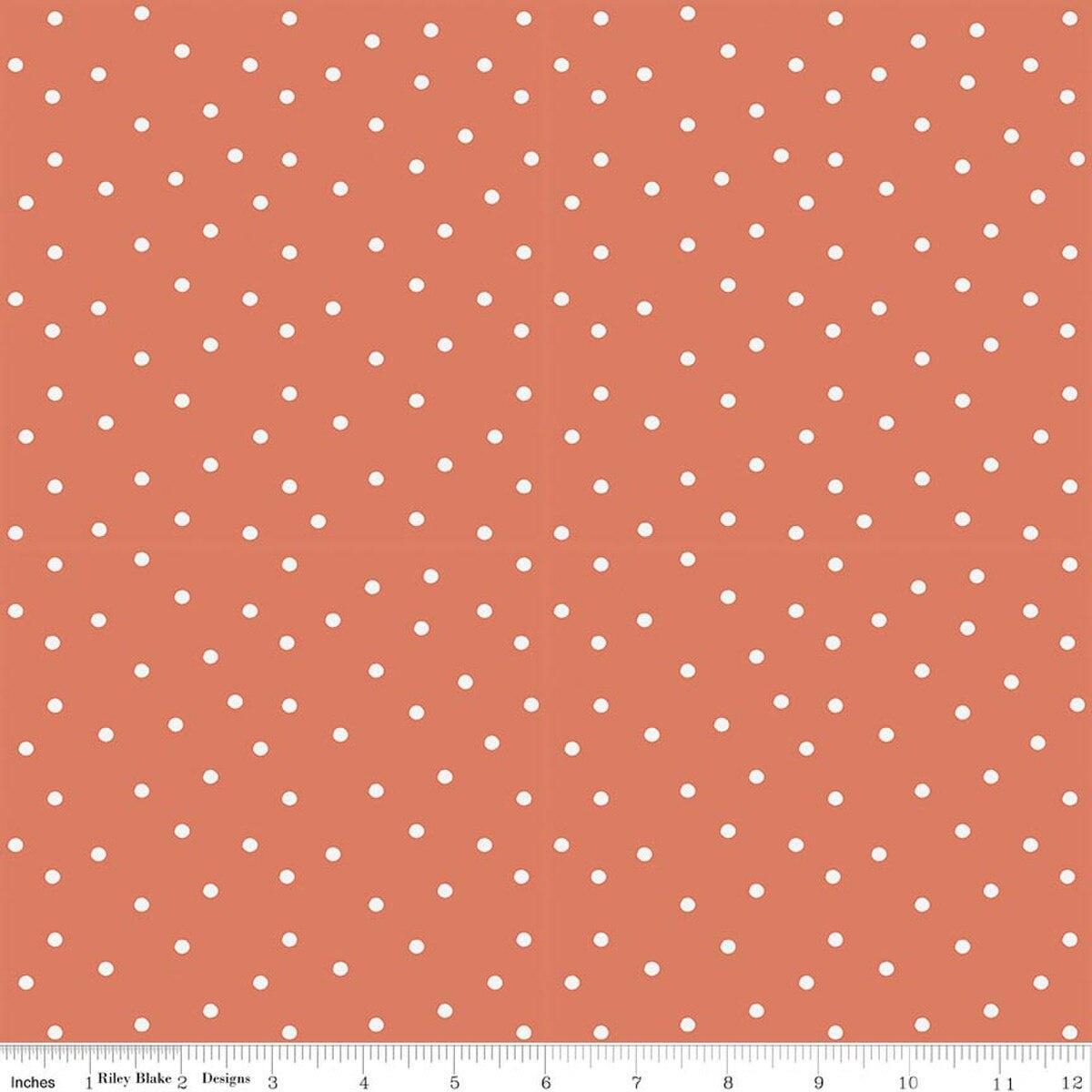 Image of Sketchbook Dots Ginger quilting cotton fabric by Lisa Audit for RIley Blake Designs. Features polka dots on an orange background. Cute Little Fabric Shop.