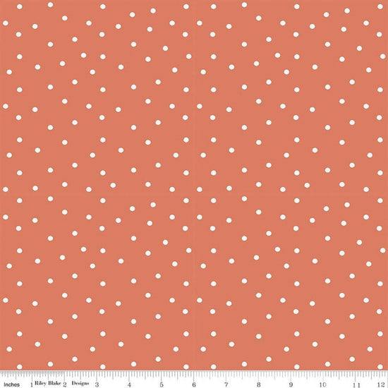 Image of Sketchbook Dots Ginger quilting cotton fabric by Lisa Audit for RIley Blake Designs. Features polka dots on an orange background. Cute Little Fabric Shop.