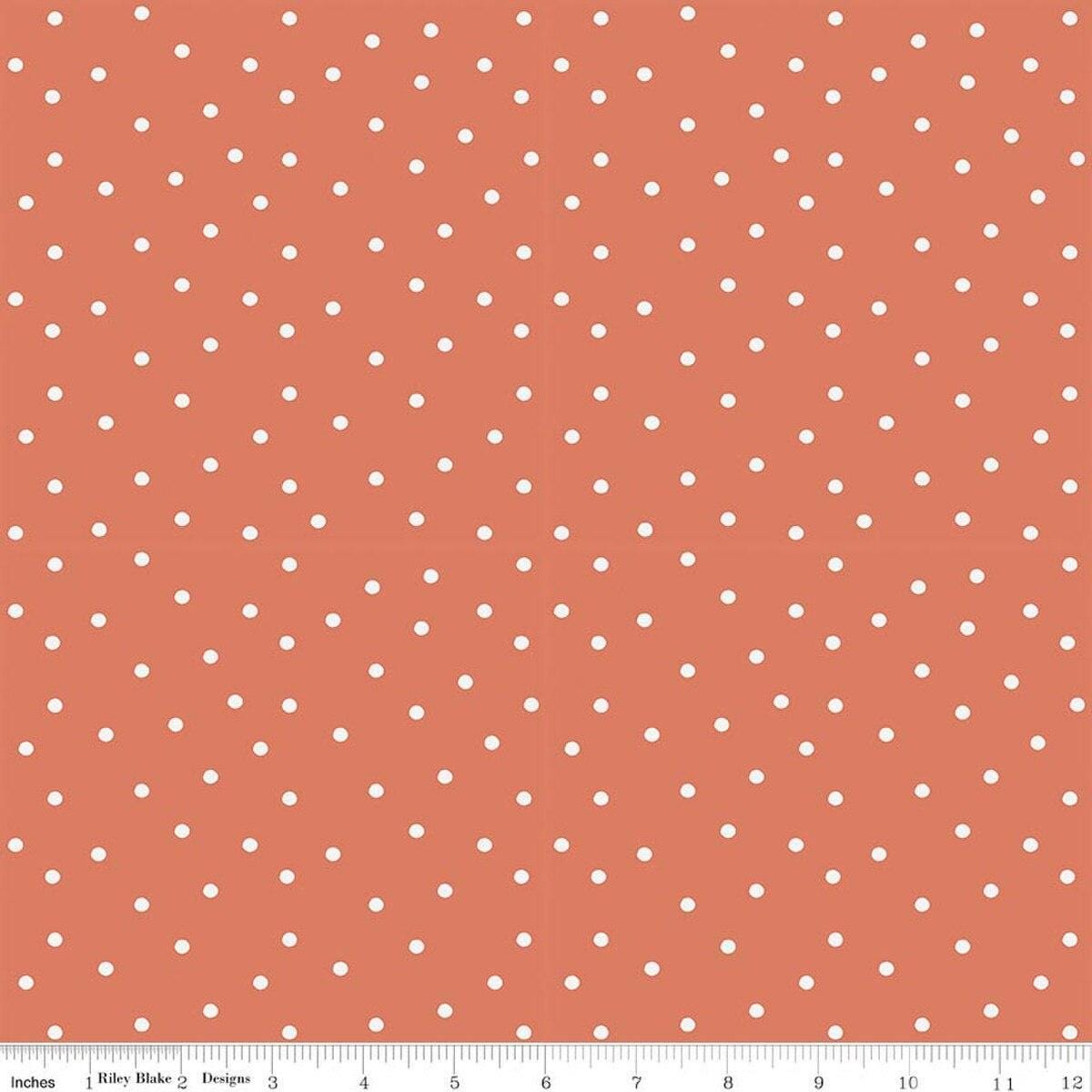 Image of Sketchbook Dots Ginger quilting cotton fabric by Lisa Audit for RIley Blake Designs. Features polka dots on an orange background. Cute Little Fabric Shop.