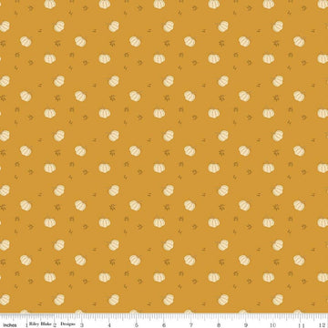 Image of Bountiful Pumpkins Gold quilting cotton fabric by Sandy Gervais for Riley Blake Designs. Features pumpkins on a gold background. Cute Little Fabric Shop.