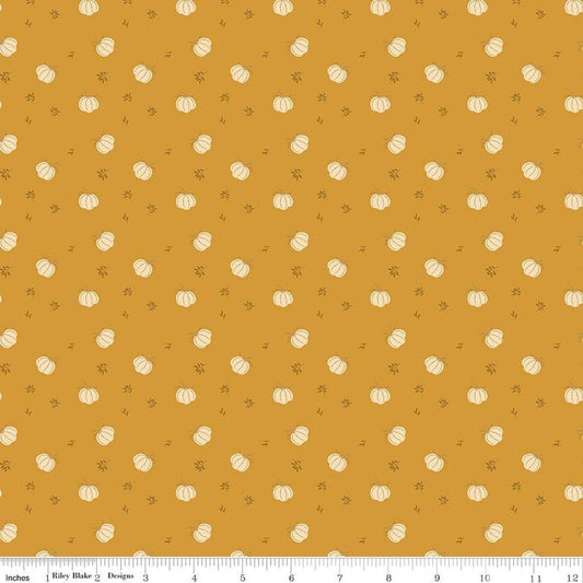 Image of Bountiful Pumpkins Gold quilting cotton fabric by Sandy Gervais for Riley Blake Designs. Features pumpkins on a gold background. Cute Little Fabric Shop.