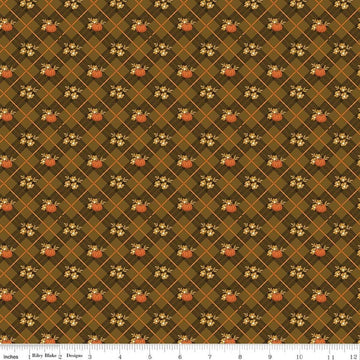 Image of Bountiful Pumpkin Plaid Suede quilting cotton fabric by Sandy Gervais for Riley Blake Designs. Features pumpkins and plaid on a brown background. Cute Little Fabric Shop.