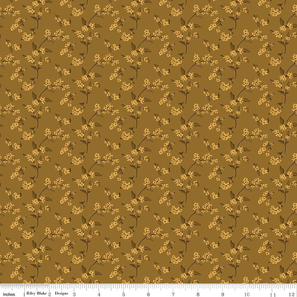 Image of Bountiful Bittersweet Suede quilting cotton fabric by Sandy Gervais for Riley Blake Designs. Features flowers on a brown background. Cute Little Fabric Shop.