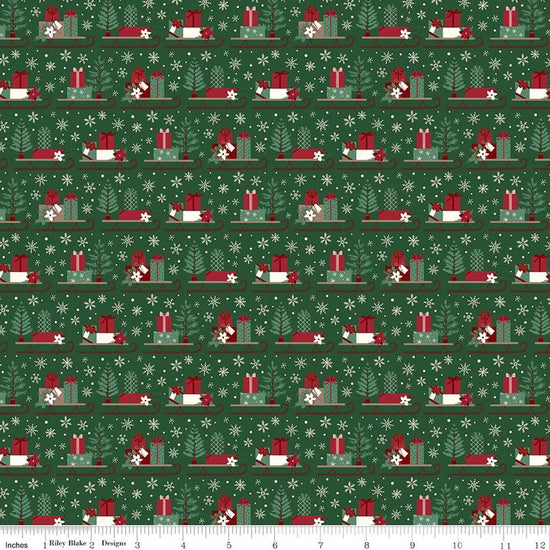Image of Christmas Time Sleds Forest quilting cotton fabric by Dani Mogstad for Riley Blake Designs. Features presents on a green background. Cute Little Fabric Shop.