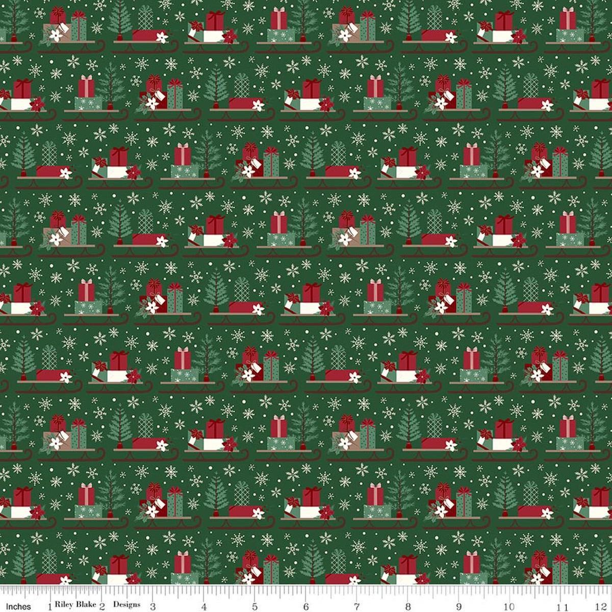 Image of Christmas Time Sleds Forest quilting cotton fabric by Dani Mogstad for Riley Blake Designs. Features presents on a green background. Cute Little Fabric Shop.