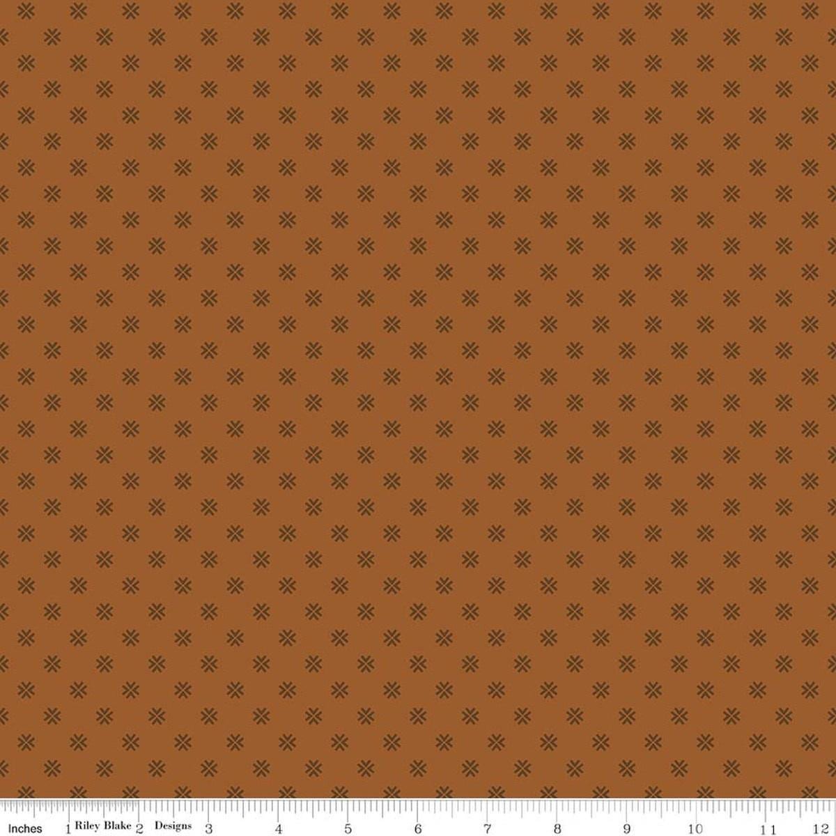 Image of Orchard House Geometric Brown quilting cotton fabric by Heather Peterson for Riley Blake Designs. Features a geometric pattern on a brown background. Cute Little Fabric Shop.