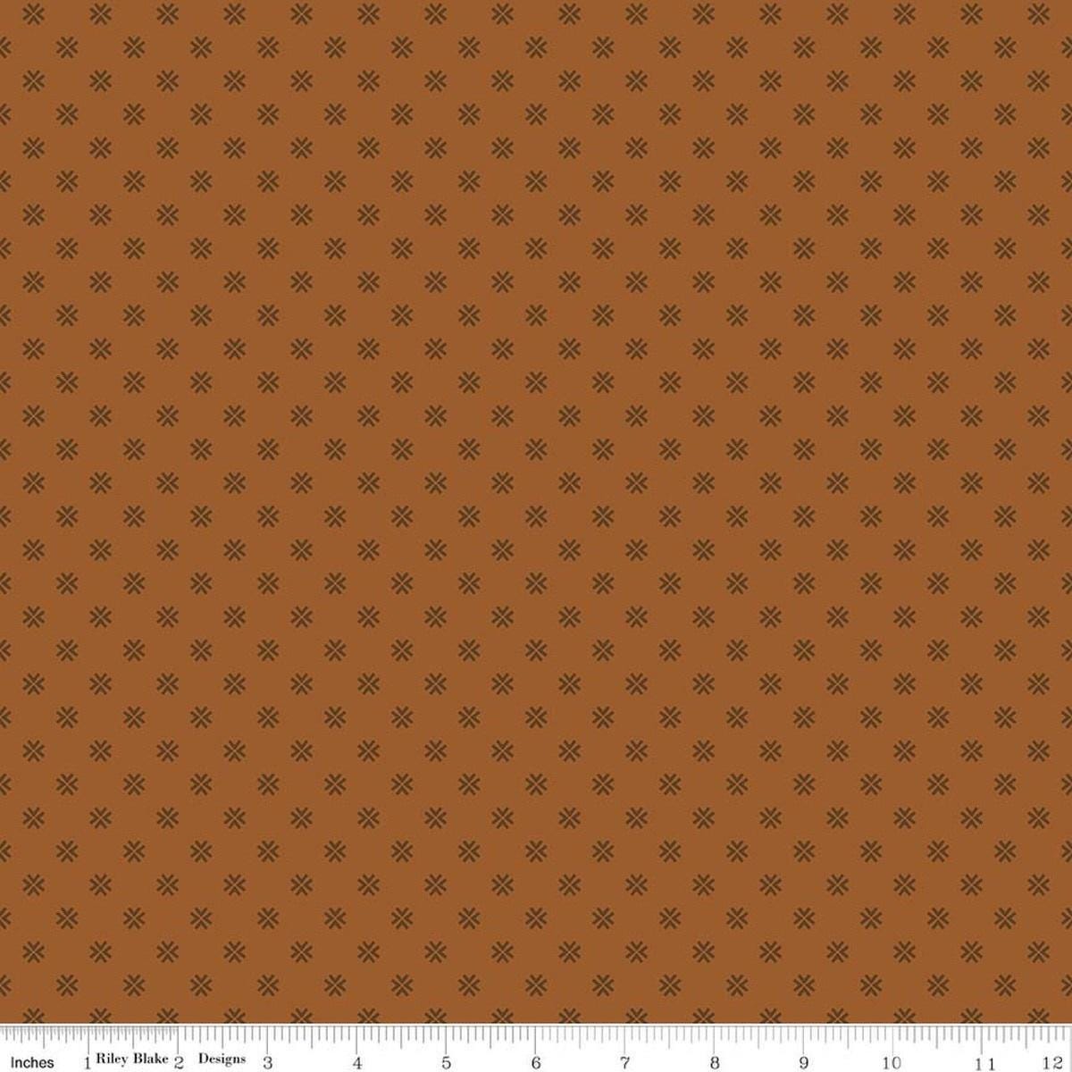 Image of Orchard House Geometric Brown quilting cotton fabric by Heather Peterson for Riley Blake Designs. Features a geometric pattern on a brown background. Cute Little Fabric Shop.