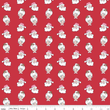 Image of Claus & Co. Santa Heads Red quilting cotton fabric by Melissa Mortenson for Riley Blake Designs. Features santa heads on a red background. Cute Little Fabric Shop.