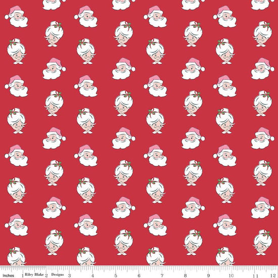 Image of Claus & Co. Santa Heads Red quilting cotton fabric by Melissa Mortenson for Riley Blake Designs. Features santa heads on a red background. Cute Little Fabric Shop.