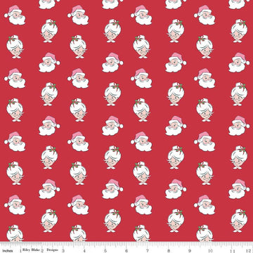 Image of Claus & Co. Santa Heads Red quilting cotton fabric by Melissa Mortenson for Riley Blake Designs. Features santa heads on a red background. Cute Little Fabric Shop.