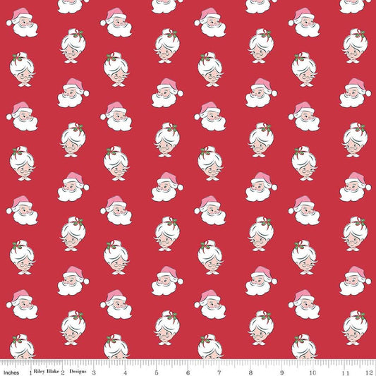 Image of Claus & Co. Santa Heads Red quilting cotton fabric by Melissa Mortenson for Riley Blake Designs. Features santa heads on a red background. Cute Little Fabric Shop.