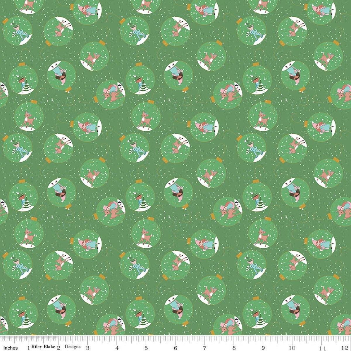 Image of Claus & Co. Ornaments Green quilting cotton fabric by Melissa Mortenson for Riley Blake Designs. Features ornaments on a green background. Cute Little Fabric Shop.