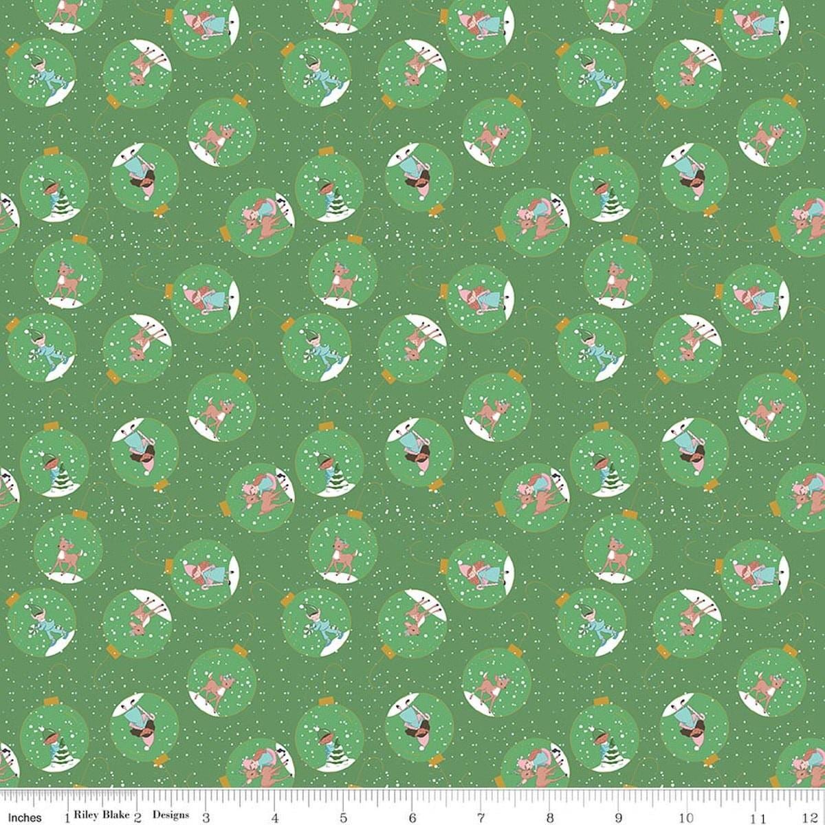 Image of Claus & Co. Ornaments Green quilting cotton fabric by Melissa Mortenson for Riley Blake Designs. Features ornaments on a green background. Cute Little Fabric Shop.