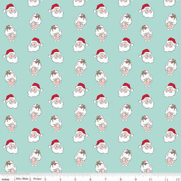 Image of Claus & Co. Santa Heads Blue quilting cotton fabric by Melissa Mortenson for Riley Blake Designs. Features santa heads on a blue background. Cute Little Fabric Shop.