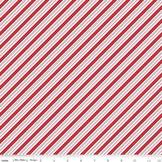 Image of Claus & Co. Candy Cane Stripes Red quilting cotton fabric by Melissa Mortenson for Riley Blake Designs. Features stripes on a red background. Cute Little Fabric Shop.