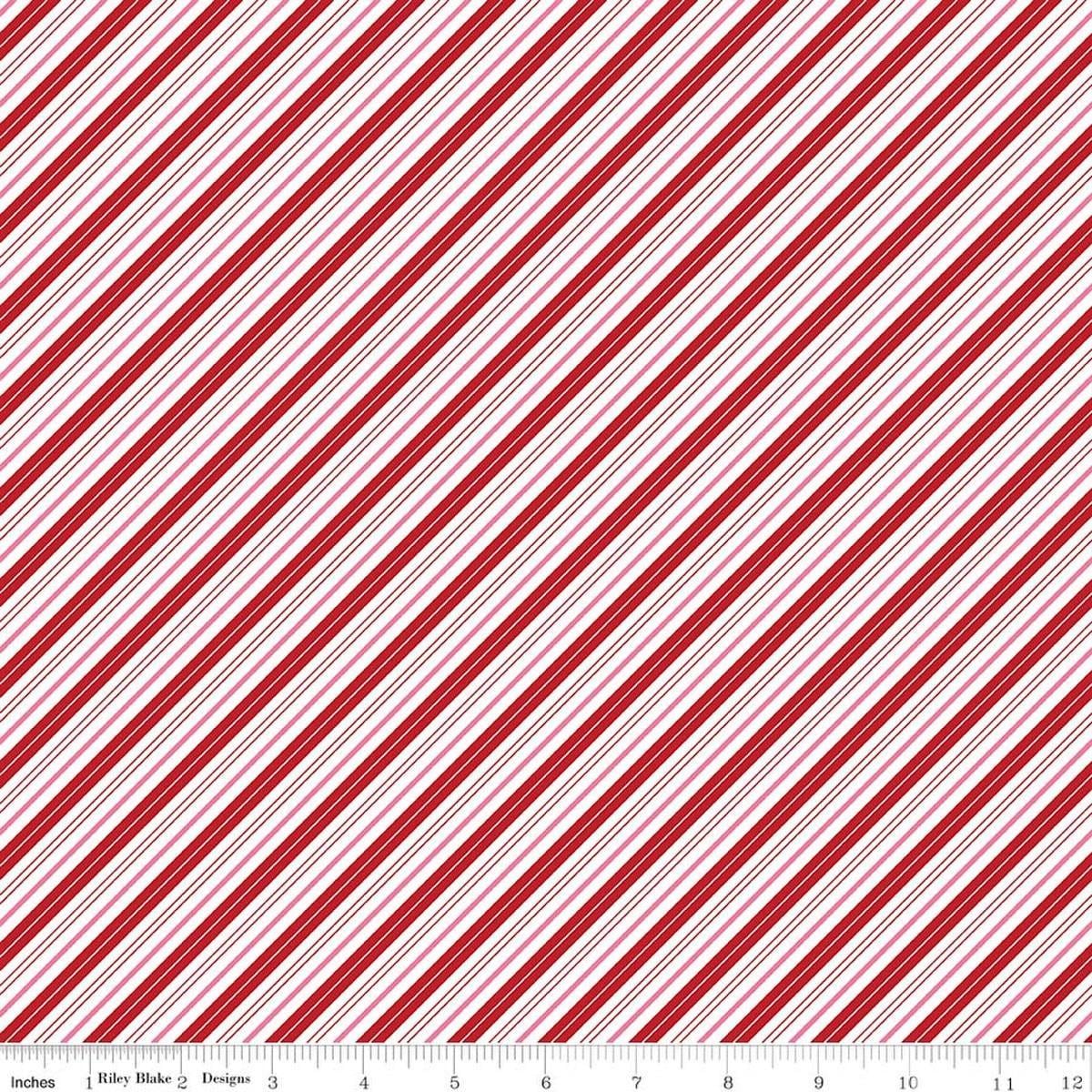 Image of Claus & Co. Candy Cane Stripes Red quilting cotton fabric by Melissa Mortenson for Riley Blake Designs. Features stripes on a red background. Cute Little Fabric Shop.